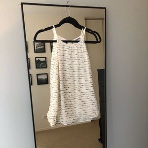 Cream “love” high neck tank with tie in the back